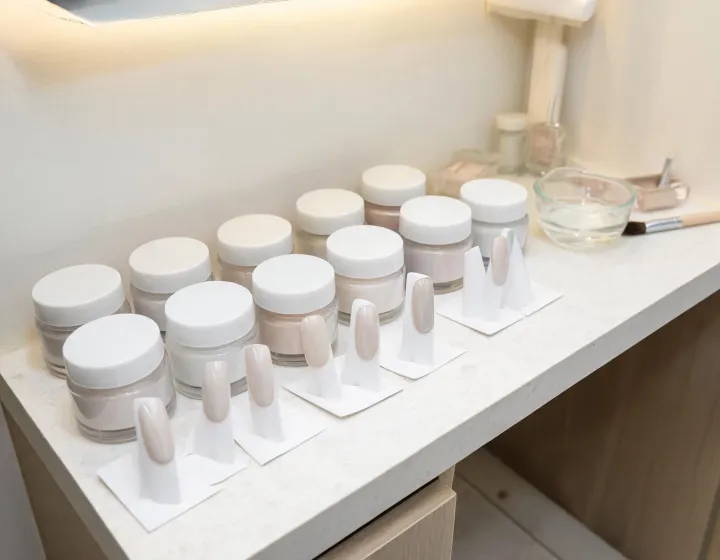 base coat for dip powder on a cosmetics bench, illustration only